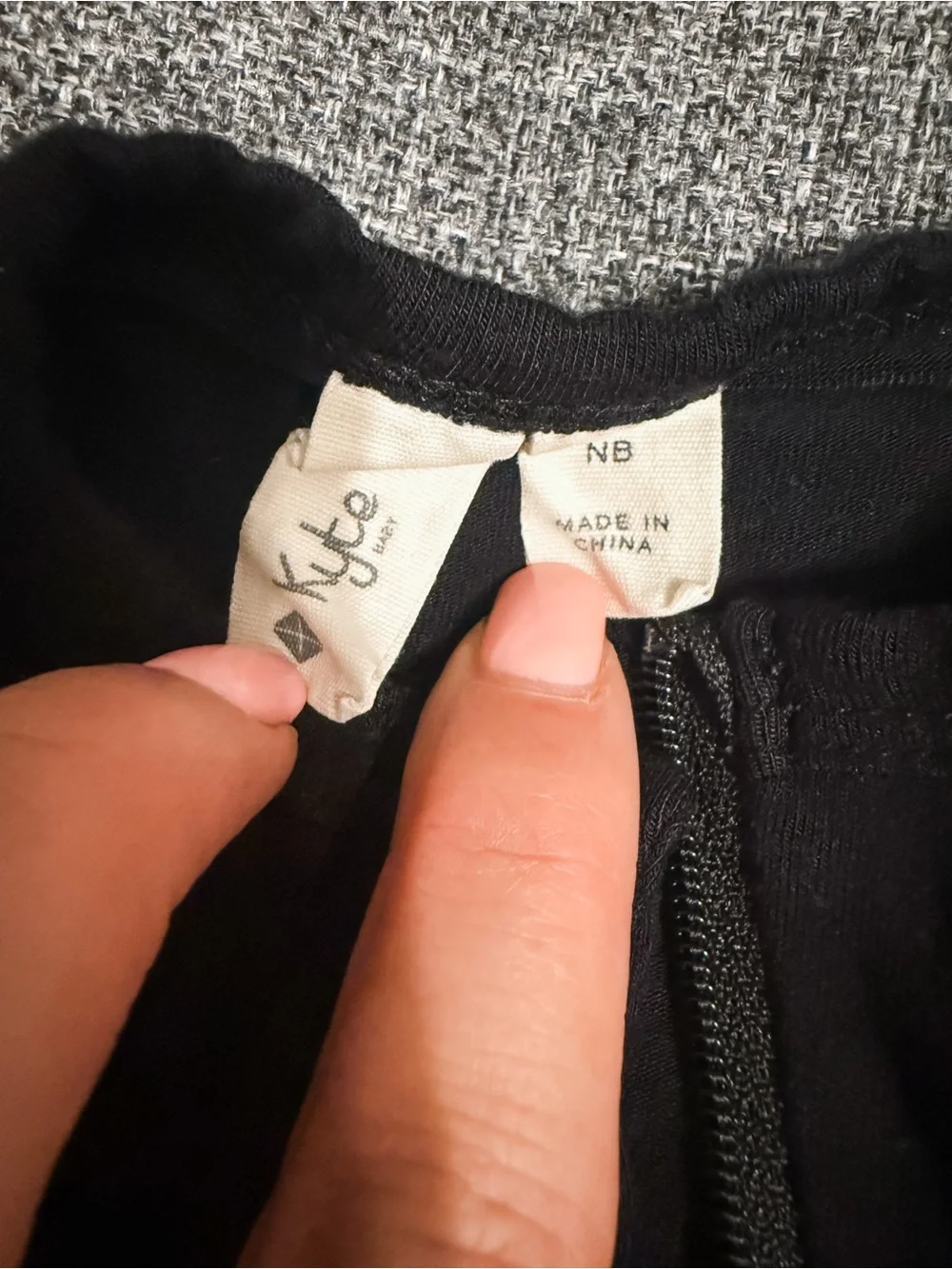 Kyte BABY Black Zip-Front Footed One-Piece